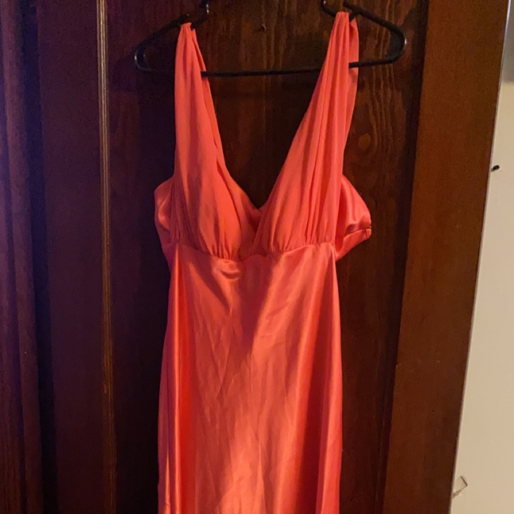 Long coral gown.
